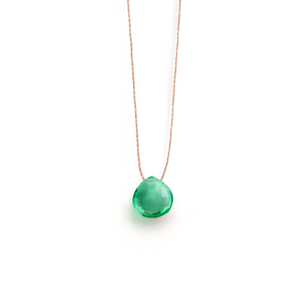 Our minimal fine cord necklace features a faceted seafoam green quartz gemstone in our signature shape, floating on a delicate fine cord. A meaningful necklace for everyday wear.