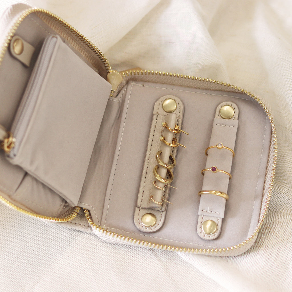 Wanderlust Life earrings and rings store in the Stackers Oatmeal colour Compact Jewellery Travel Case.