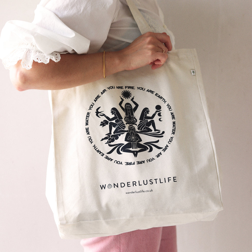 Wanderlust Life Sustainable Elemental Tote, made with recycled sustainable materials. Designed to represent our Elemental Collection, illustrated by Clara Jonas. Shop the Elemental collection online at Wanderlust Life.