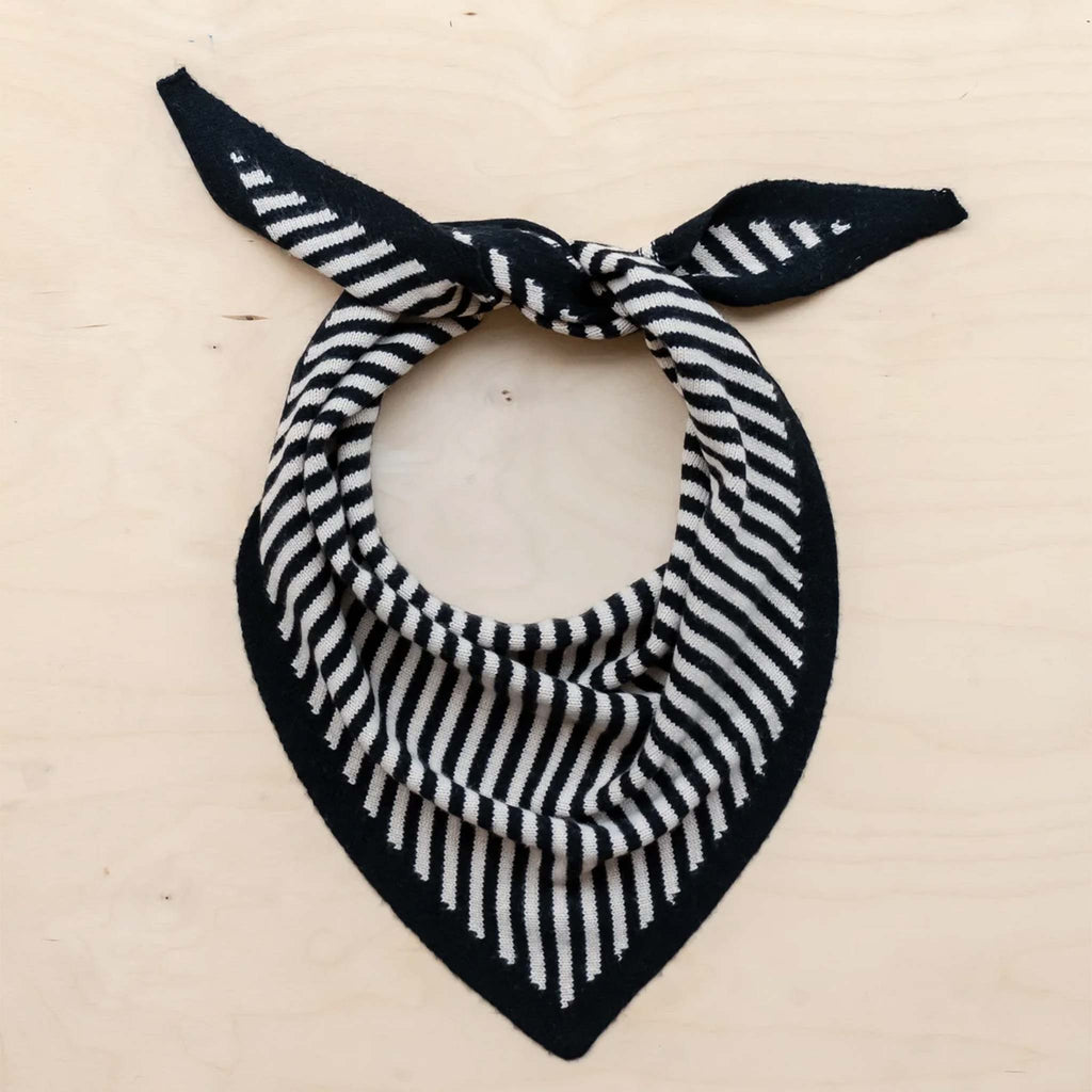 A triangle style scarf in a monochrome striped design.
