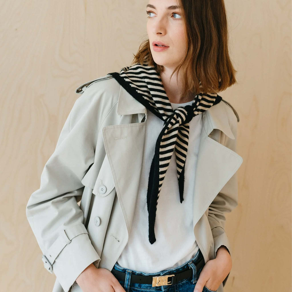 A triangle style scarf in a monochrome striped design.