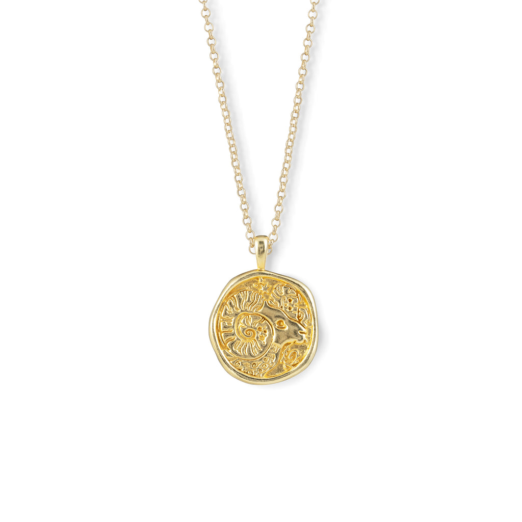 A beautifully embossed gold vermeil pendant coin, featuring a hand-illustrated interpretation of the Aries Zodiac sign. Designed in collaboration with illustrator Lauren Marina, each piece reimagines astrological symbolism through evocative, tactile artwork.