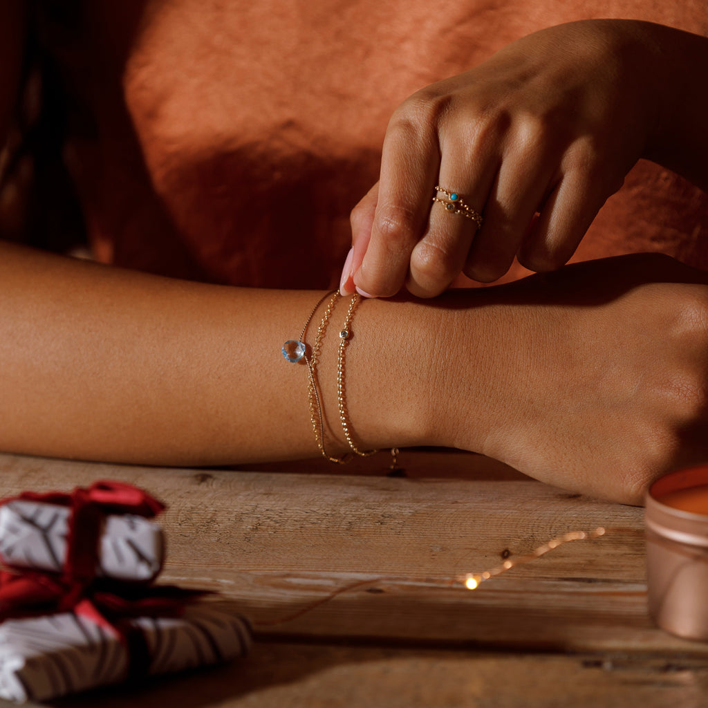 November Topaz chain link Ring and the December Turquoise Chain link ring in a stack.
