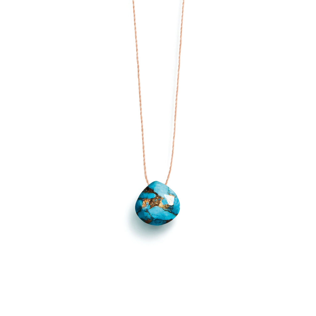 Wanderlust Life mohave turquoise fine cord necklace. A minimal necklace with a blue stone in the signature shape from Wanderlust Life Jewellery. Designed and handmade in Devon, UK.