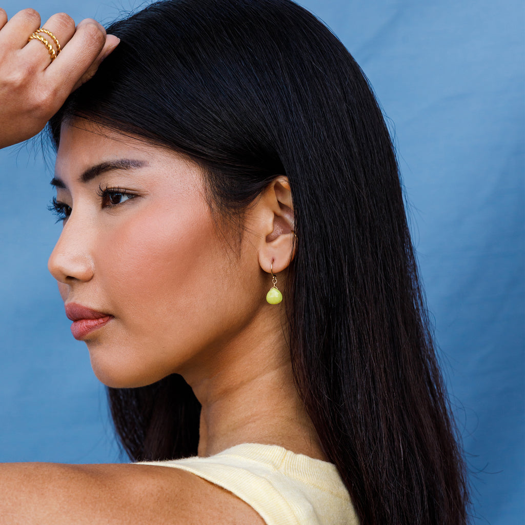 Yellow seraphinite gemstones in our signature faceted shape hangs from a minimalist gold ear wire