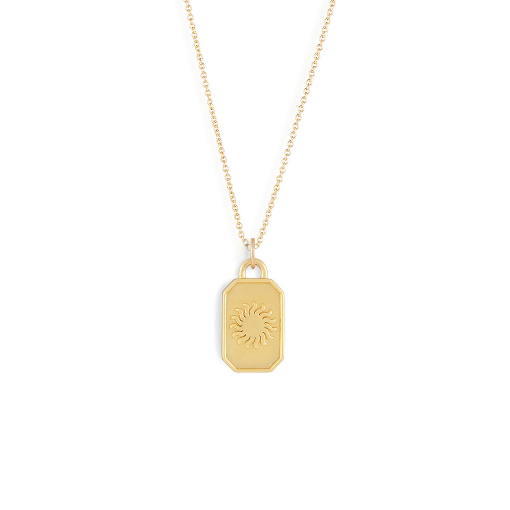 A stylised sun on the front of this gold octagonal charm celebrates the classical element of fire. The back is blank for engraving.