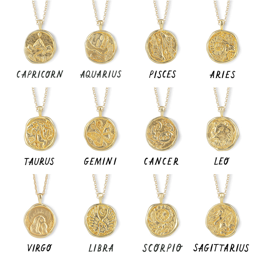 The full Wanderlust Life Zodiac Collection Gold Pendants