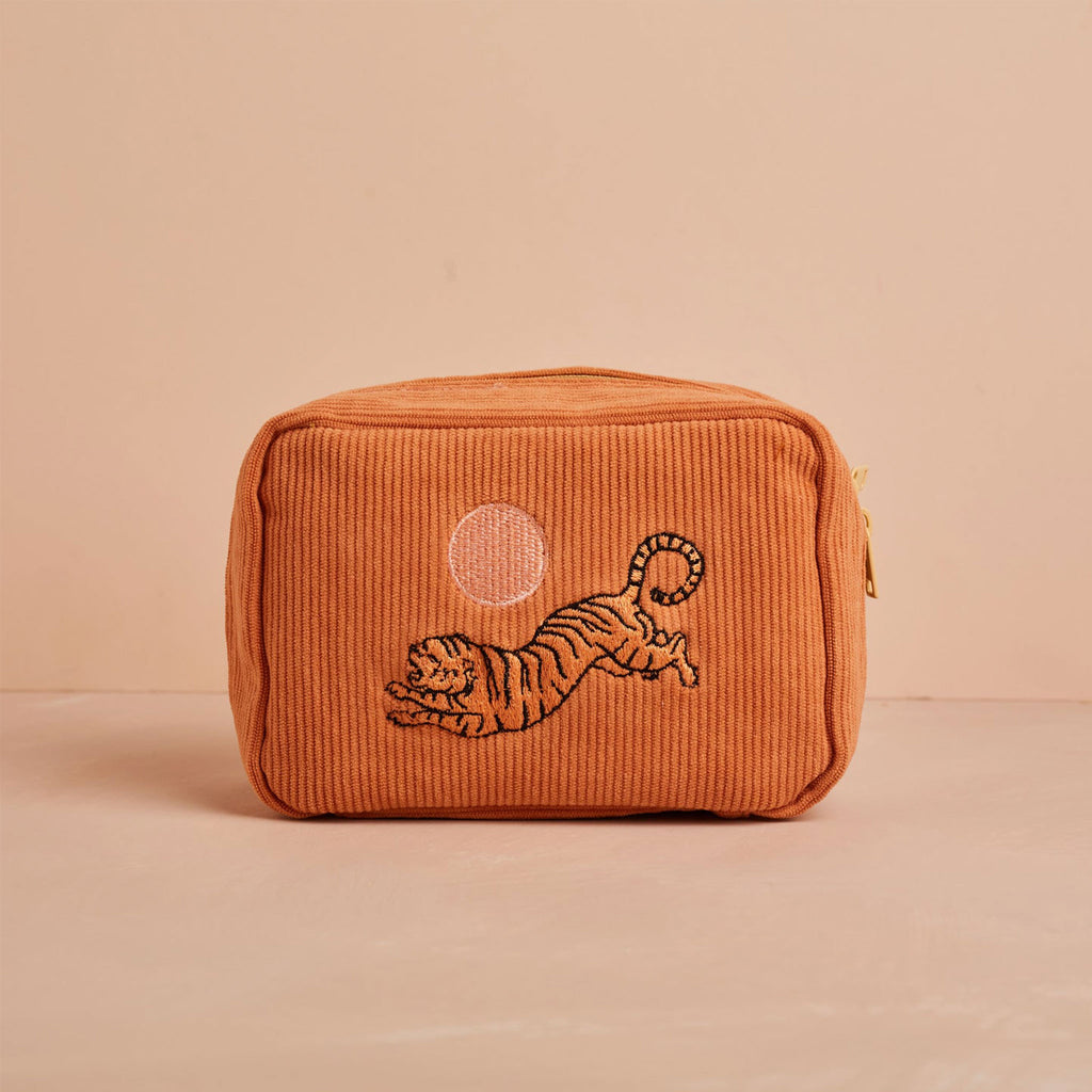 New to Wanderlust Life,  from independent brand Cai & Jo: corduroy makeup bag, embroidered with tiger design. Perfect for everyday essentials, makeup, hair and beauty products for storing  at home, travelling, work and gym. Quality fabric, affordable gift.