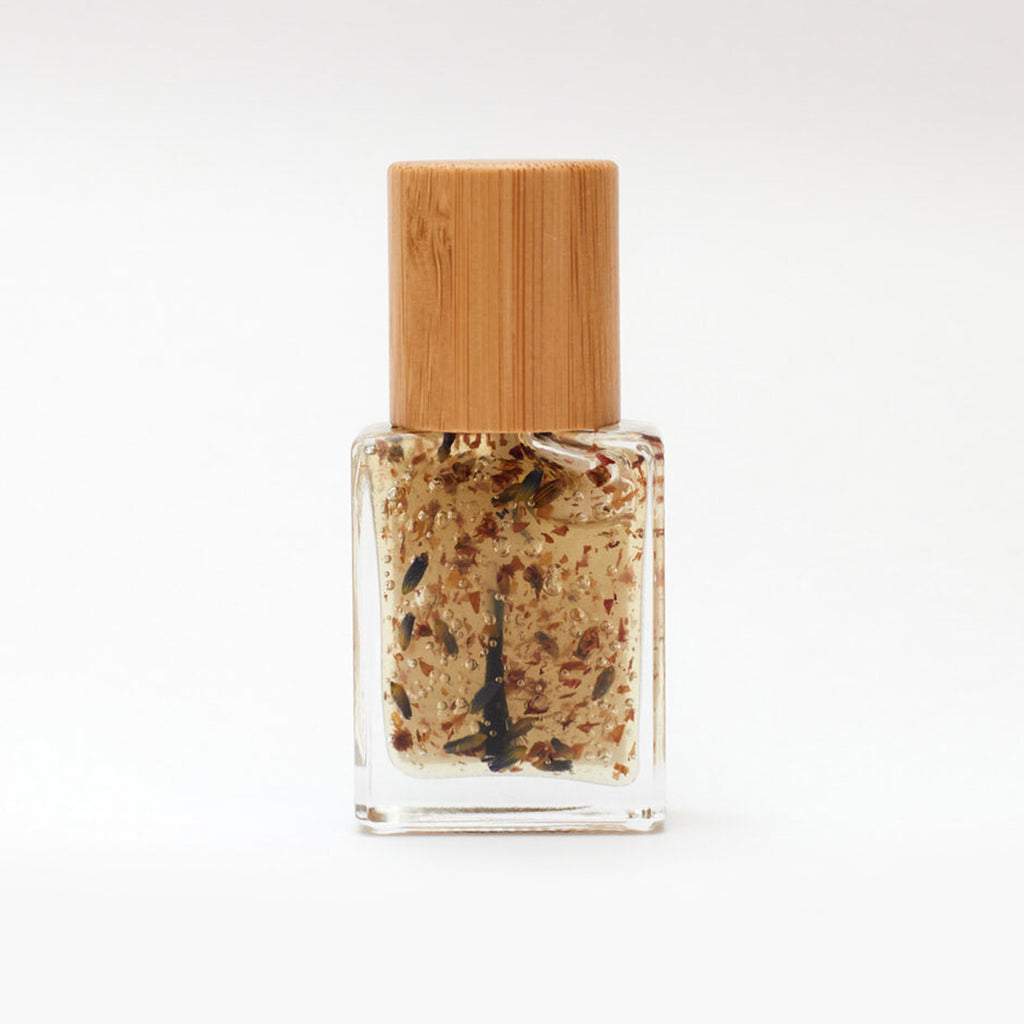 Licia Florio's first cuticle oil, made with essential oils and dried flowers at Wanderlust Life jewellery, UK stockist of Licia Florio vegan nail polishes.