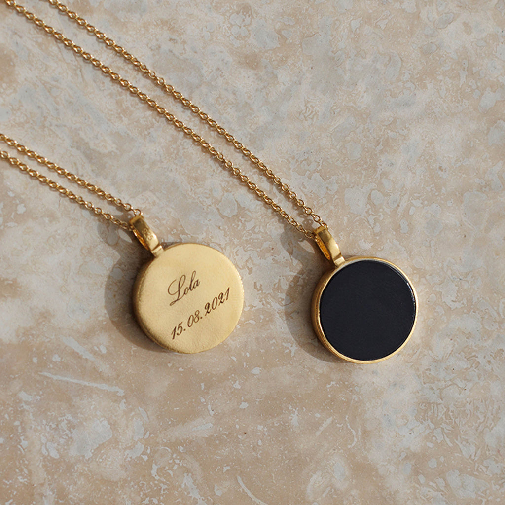 Wanderlust Life jewellery, engraved porthole gold chain necklace with black onyx gemstone with solid back. Proudly designed in Devon & handcrafted by our Wanderlust Life global artisan partners.